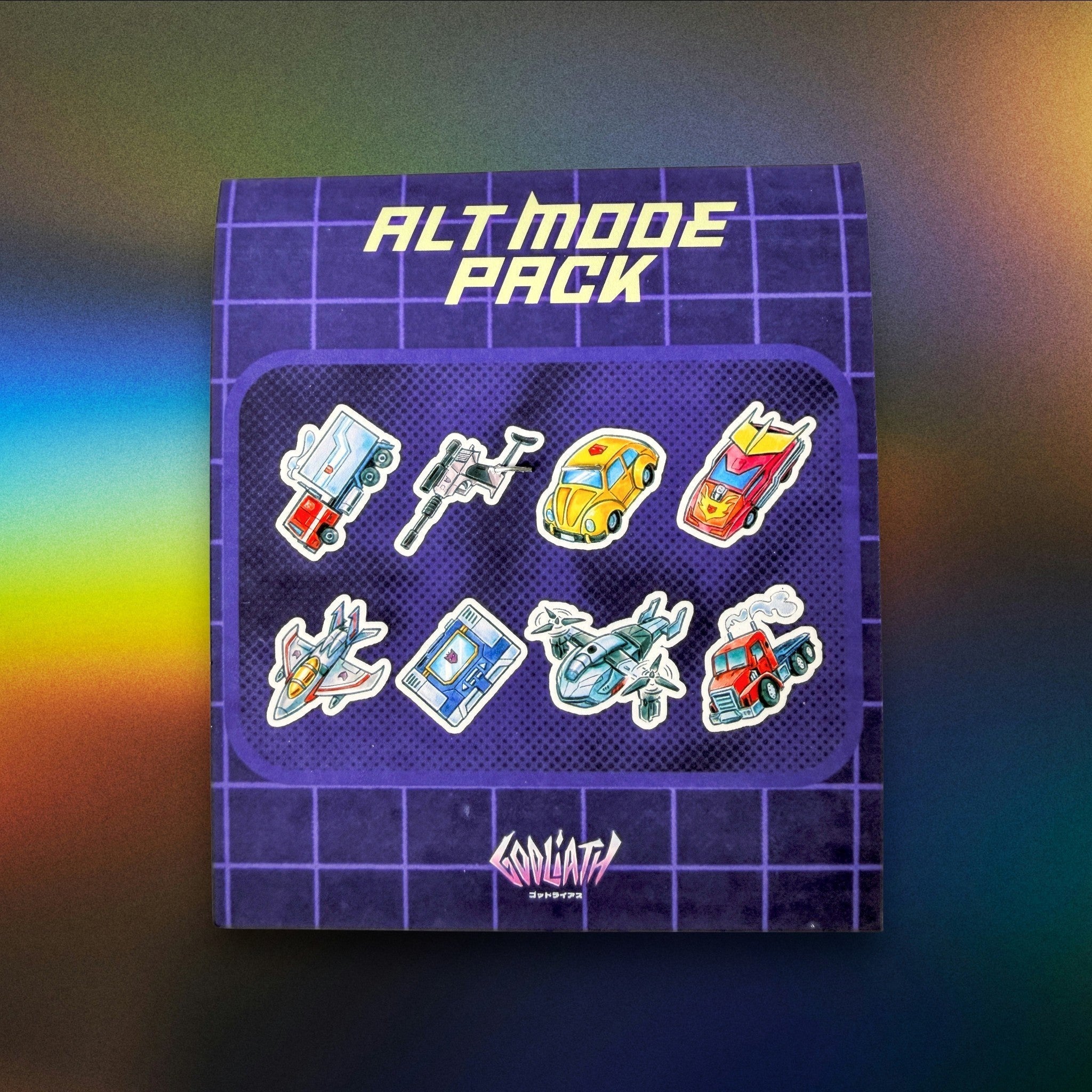 Godliath Alt Mode mini vinyl sticker pack featuring 8 retro robot vehicle designs in a compostable bag.