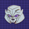 Godliath 1.25 inch hard enamel pin of TFP Dark Energon Megatron with silver metal and glow-in-the-dark purple optics.