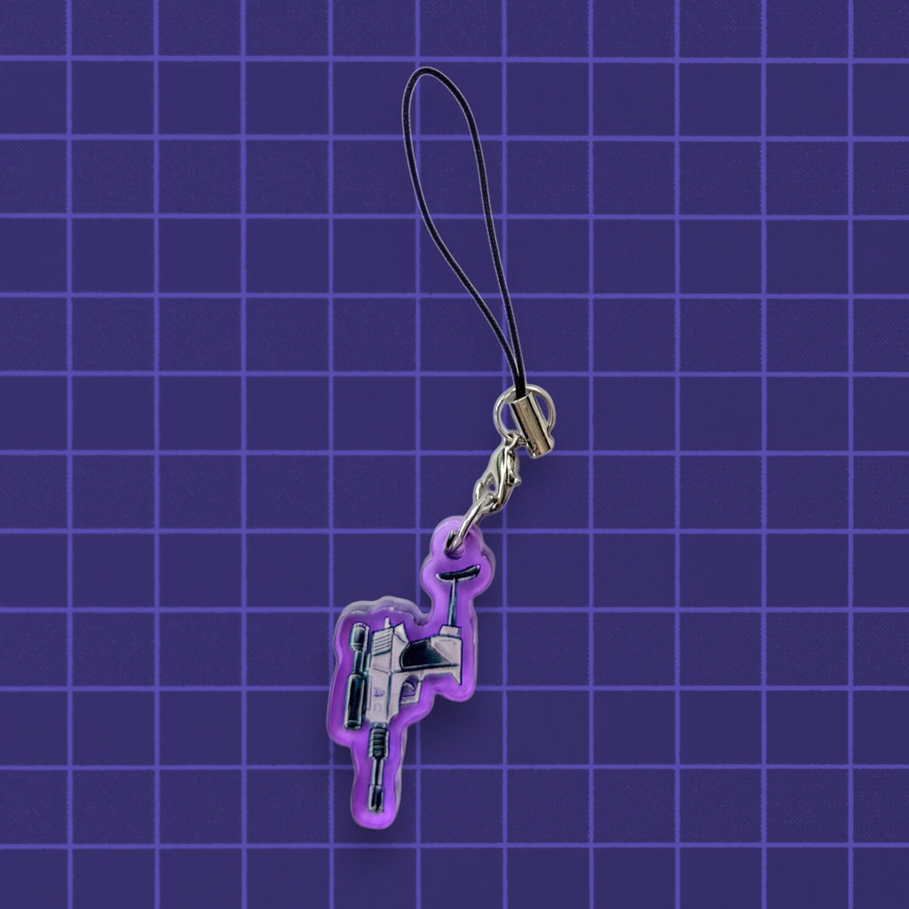 Godliath G1 Alt Mode acrylic phone charm featuring a detailed blaster design on a purple grid background