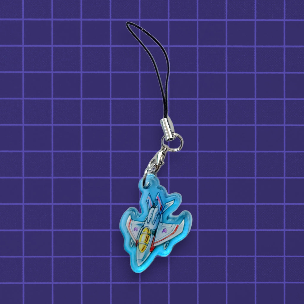 Godliath G1 Alt Mode acrylic phone charm featuring a blue and white fighter jet design on a purple grid background