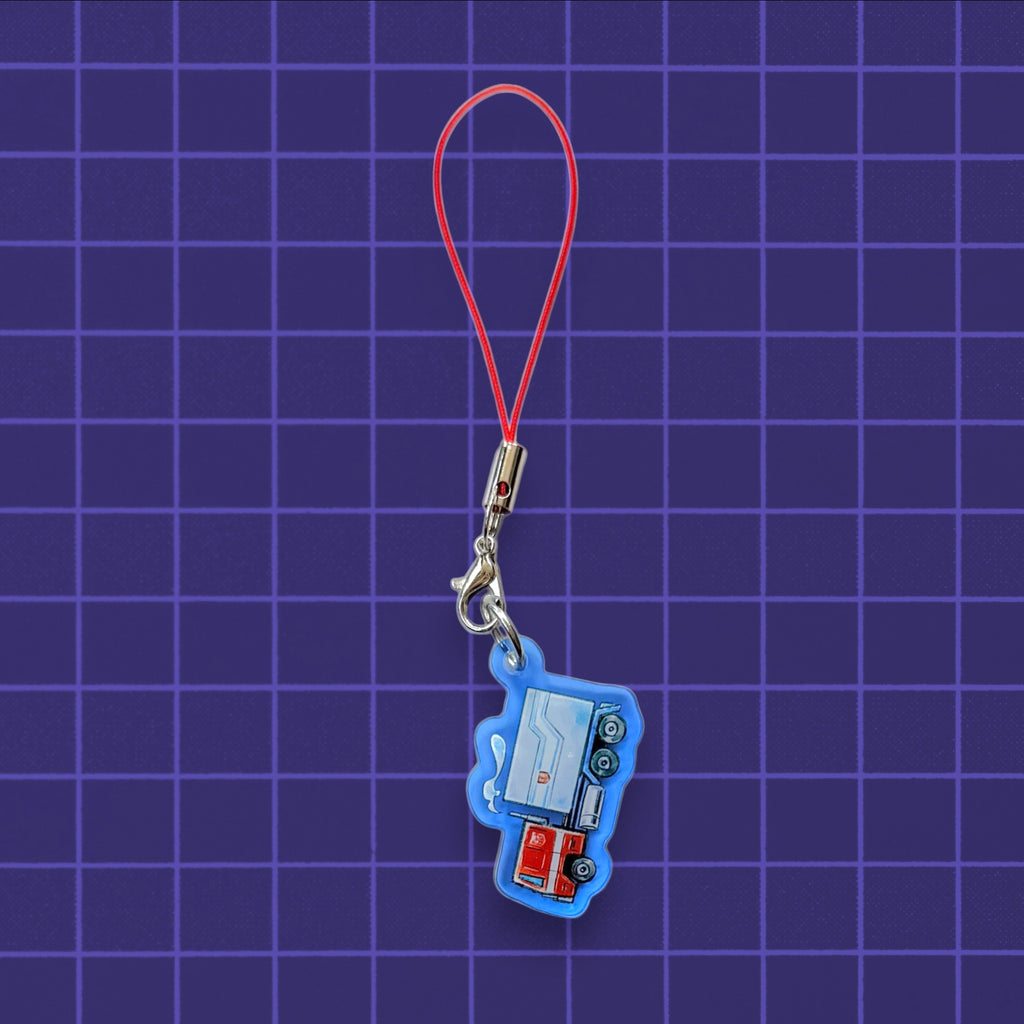 Godliath G1 Alt Mode acrylic phone charm featuring a blue and red truck design with a red cord strap.