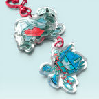 Godliath ES MegOp Airlift linked acrylic charm with red heart clasp, featuring robot characters in blue and red.