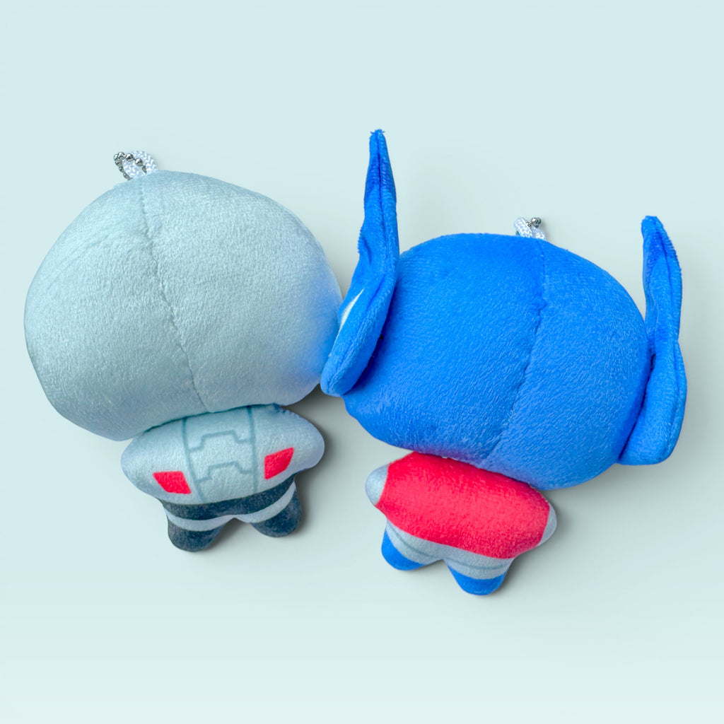 Godliath ES MegOp plush charms featuring soft blue and grey robot characters with silver ball chain clasps.