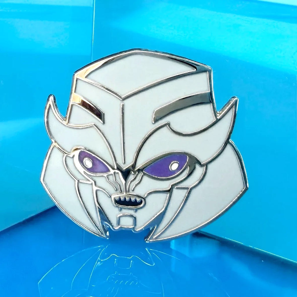 Godliath TFP Dark Energon Megs hard enamel pin with silver metal and glow-in-the-dark purple optics.