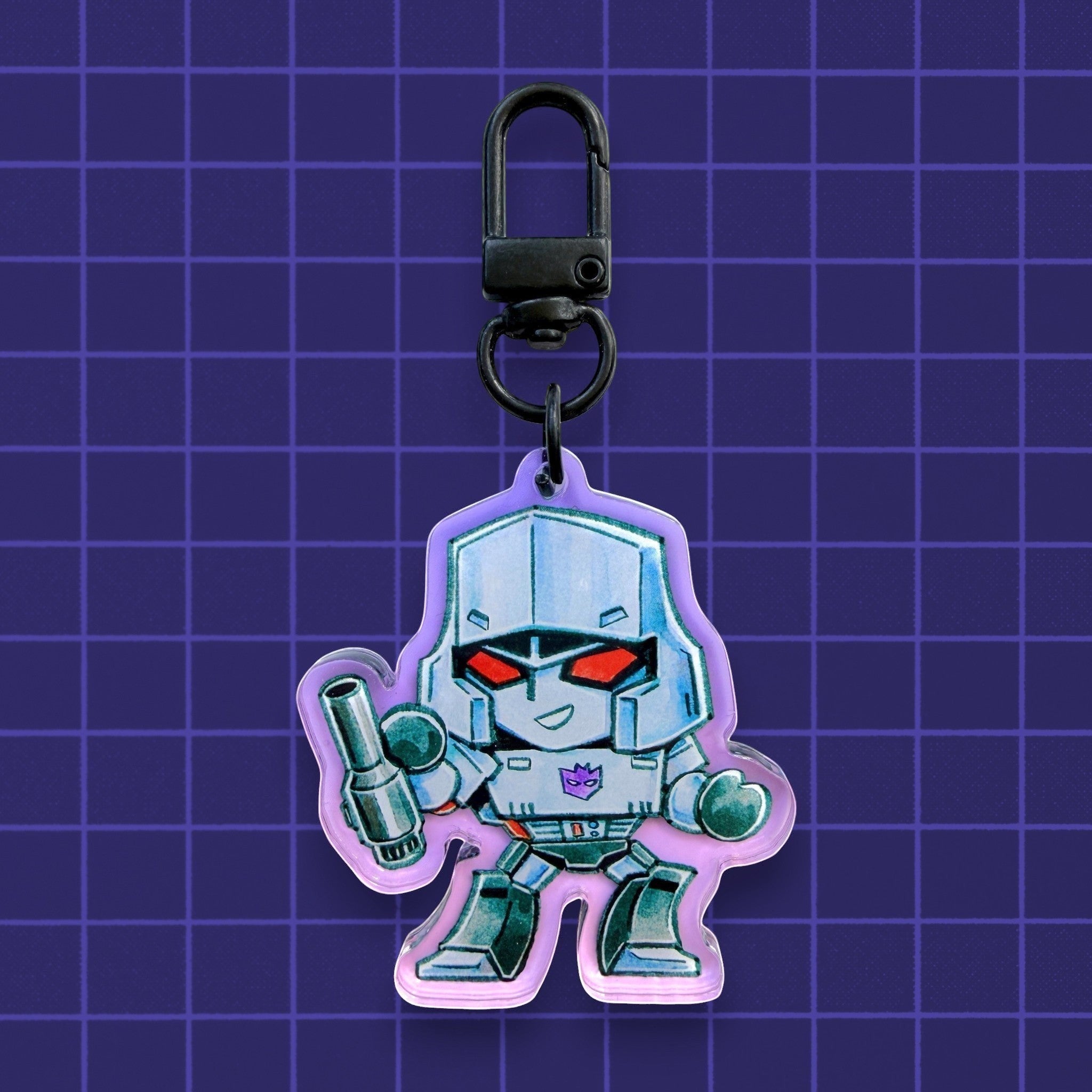 Godliath Tinybots G1 Megatron acrylic keychain with a translucent purple gradient and black lobster clasp.