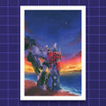 Godliath Wonderful World print featuring Optimus Prime and Megatron standing on a beach at sunset on matte paper